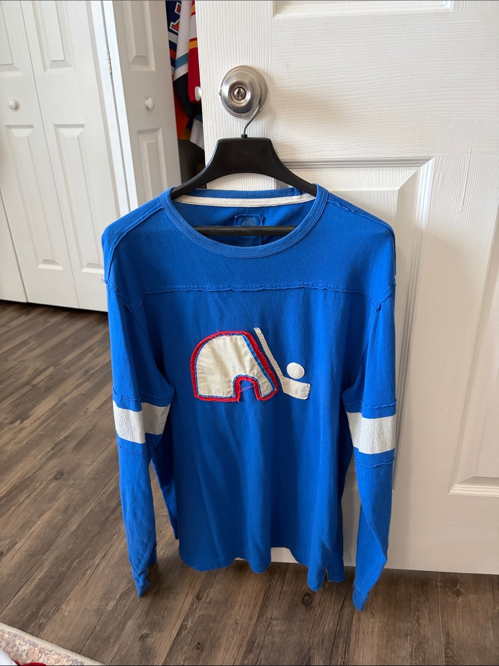 CCM Royal Blue Long-Sleeve Hockey Jersey with Helmet Applique
